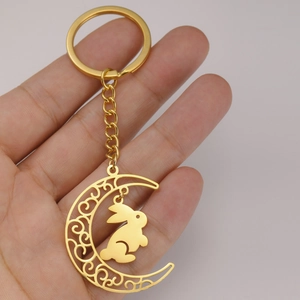 Porte-clés en acier inoxydable doré avec lune évidée et pendentif de lapin
