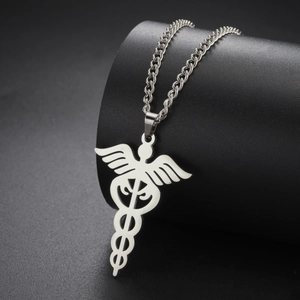Detailed view of silver stainless steel Caduceus pendant on a rugged chain link necklace