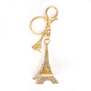 Golden Eiffel Tower keychain featuring luxury rhinestone inlay and lobster clasp accessory