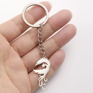 Polished stainless steel phoenix key ring featuring a hollowed-out metal pendant design