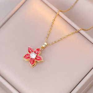 Elegant gold titanium steel necklace with a red zircon flower pendant in a gift box