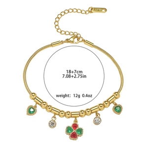 Bracelet chaîne serpent dorée en acier inoxydable avec charmes cœur et trèfle