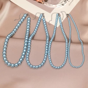 Elegant light blue pearl necklaces in four sizes with polished metal clasps and extenders
