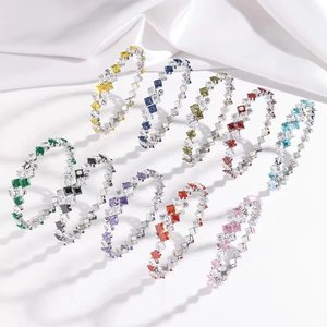 Eternity rings with colorful square-cut stones and clear zircons in a silver finish