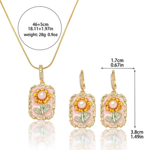 Sonnenblumen Halskette und Ohrringe Set mit Naturperlen und rosa Emaille in Goldoptik