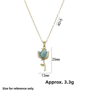 Gold tulip pendant necklace with light blue opal and white zircon crystals on a 40cm chain