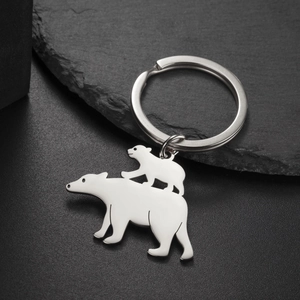 Polished stainless steel polar bear keychain with mom and cub silhouette details