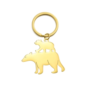 Polished gold stainless steel keychain featuring a cute polar bear family silhouette