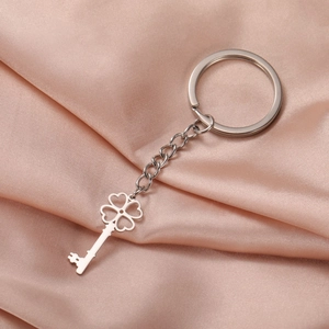 Silver four-leaf clover key pendant on stainless steel chain with a large metal ring
