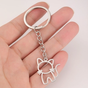 Porte-clés mignon avec pendentif chat évidé en acier inoxydable argenté poli