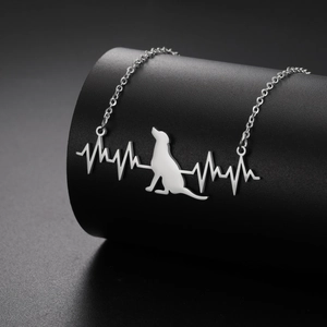 Silver stainless steel necklace with ECG heart rate dog pendant on a display stand