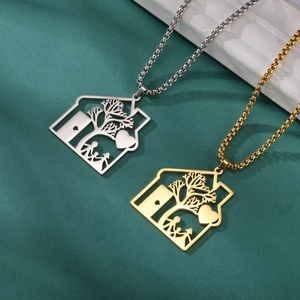 Collar de casa familiar en oro y plata con recorte de corazón para padres e hijos