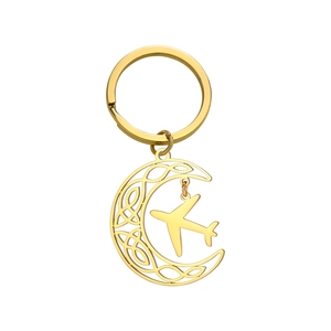 Gold hollow moon keychain with small airplane pendant made of stainless steel