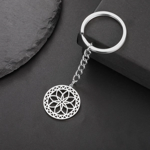 Silver stainless steel keychain with hollow circular Flower of Life geometric pendant