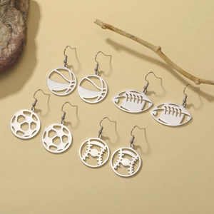 Detailed set of four stainless steel sports earrings featuring hollow ball designs