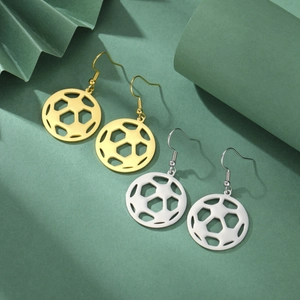 Detail view of hollow football earrings in gold and silver stainless steel finish
