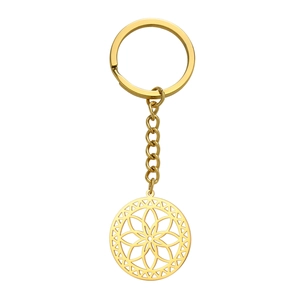 Golden stainless steel keychain with hollow mandala flower pendant on white background