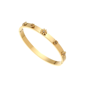 Vintage gold plated stainless steel bangle featuring 3D floral reliefs and zircon accents
