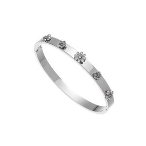 Detailed macro view of silver steel hinge bangle with five 3D floral petal carvings