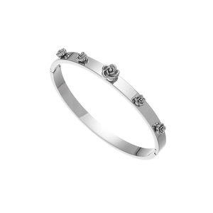 Detailed close-up of a silver stainless steel bangle with five 3D rose flower accents
