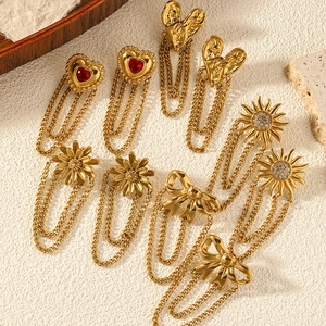 Golden heart and floral tassel earrings set featuring vintage hammered metal texture