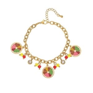 Gold stainless steel bracelet with colorful citrus slice charms and crystal bead accents