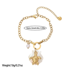 Detail of 18K gold-plated stainless steel bracelet with sea turtle and shell charms