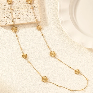 Elegant gold five-petal flower long sweater chain necklace in stainless steel