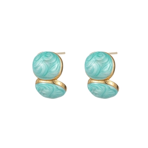 Detail of light blue textured enamel and gold-plated titanium steel earrings set