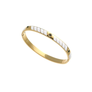 Polished gold titanium steel bangle with white enamel inlay and black zircon stones
