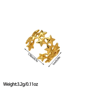 Detail shot of golden star cut-out ring with dimensions 1.78cm and 3.2g weight
