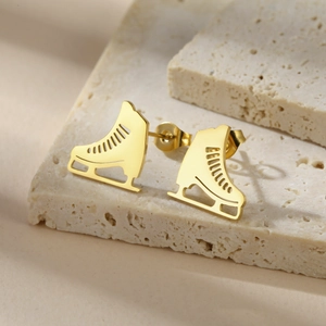 Creative gold ice skate stud earrings made of polished stainless steel for women