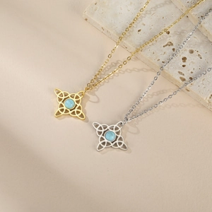 Detailed close-up of gold and silver Celtic knot necklaces with turquoise insets
