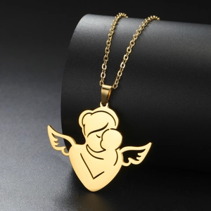 Detail view of golden angel mother holding baby pendant on a fine link chain necklace