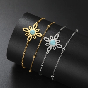 Zweilagiges Hexenknoten Armband in Gold und Silber mit blauem Stein und Mondsichel Anhänger