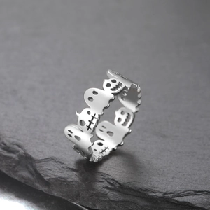 Minimalist silver ghost and pumpkin Halloween ring with intricate cutout design