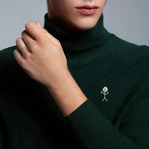 Dark green turtleneck knit sweater featuring a white stickman graphic on the chest