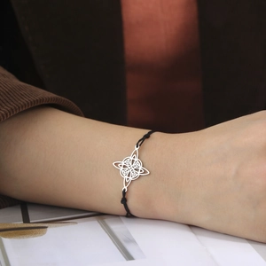 Adjustable black cord bracelet with silver stainless steel Celtic Witch's Knot pendant