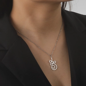 Modern minimalist silver stainless steel necklace with hollow lotus spiral pendant on model