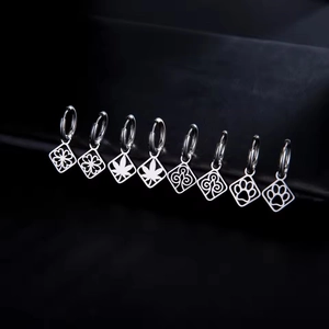 Polished stainless steel square pendants featuring star and geometric cutouts for DIY jewelry