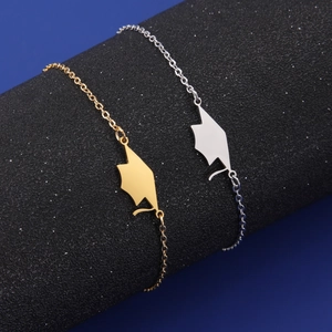 Detailed view of silver and gold graduation cap charms on stainless steel chains