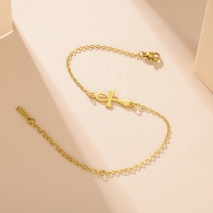 Detailed close-up of gold stainless steel Ankh cross bracelet with lobster clasp