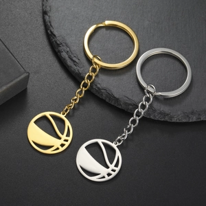 Detailed view of basketball theme metal keychains in gold and silver finish
