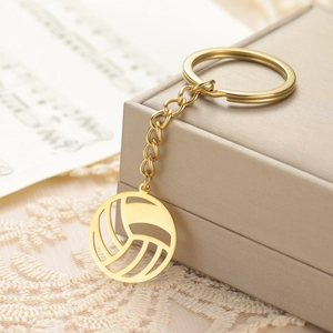 Detailed close-up of a golden volleyball keychain made of high-quality stainless steel