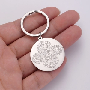 Macro shot of 304 stainless steel keychain featuring detailed eagle head engraving