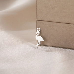 Polished stainless steel flamingo charm with a secure round loop for DIY jewelry making