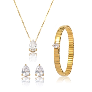 Détail du collier à pendentif goutte, boucles d'oreilles et bracelet serpent doré