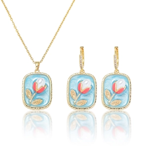 Elegant freshwater pearl tulip flower necklace and earring set with blue enamel