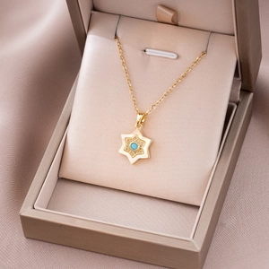 Elegante collana a stella in argento S925 dorato con pietra blu e madreperla in box