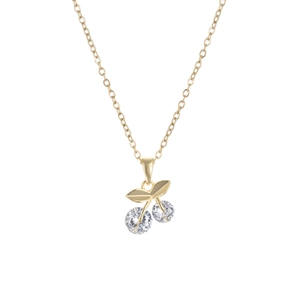 Detailed close-up of a gold cherry pendant with faceted clear zircon stones and leaves